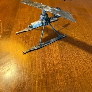 Spark plug airplane metal figure.